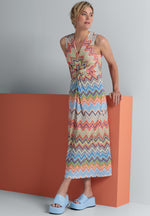 Bianca Dinorah Dress. A sleeveless midi length dress with V-neckline and multicoloured zigzag print.