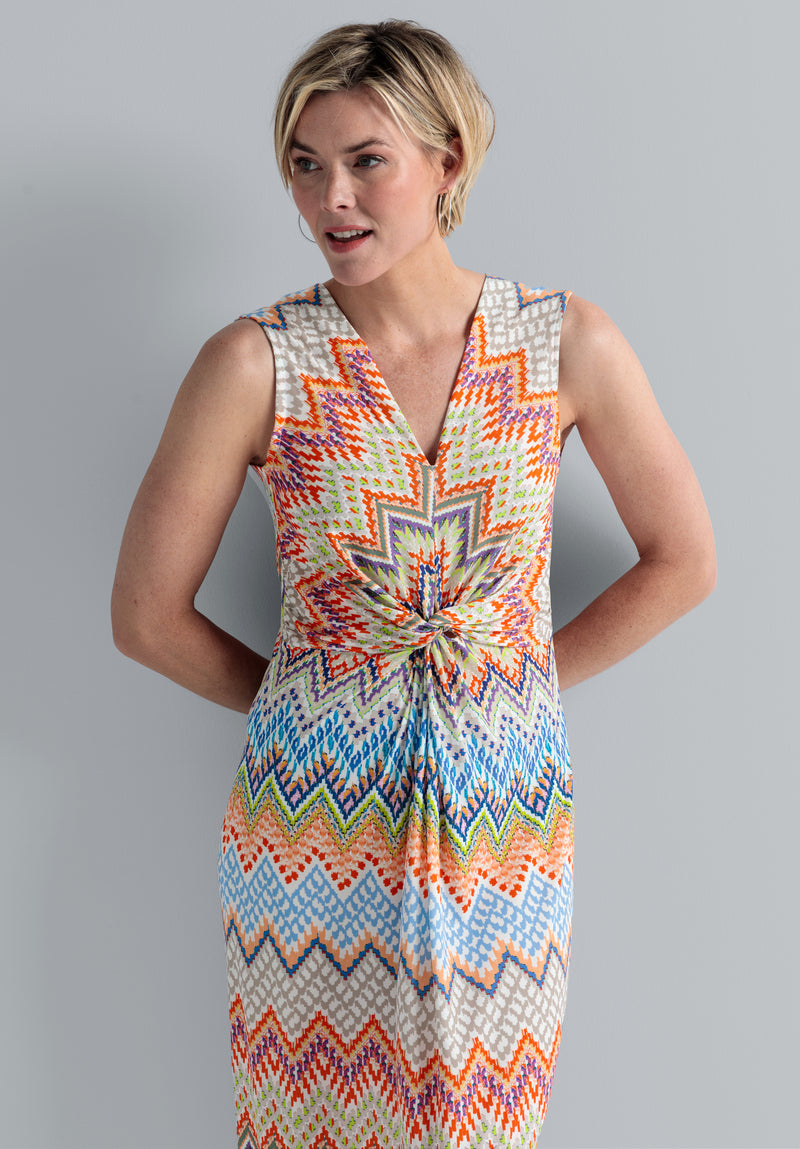 Bianca Dinorah Dress. A sleeveless midi length dress with V-neckline and multicoloured zigzag print.