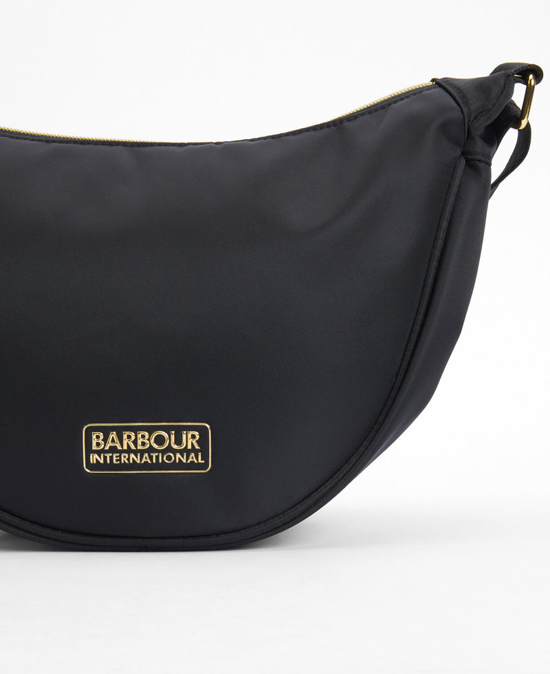 An image of the Barbour International Qualify Sling Bag in Black.