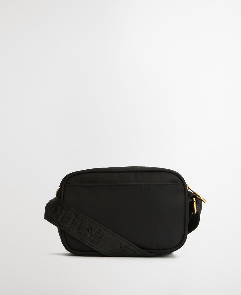 An image of the Barbour International Qualify Micro Crossbody in Black.