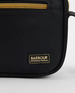 An image of the Barbour International Qualify Micro Crossbody in Black.