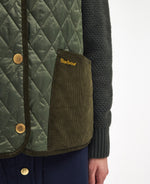 An image of the Barbour Healy Liner in Olive.