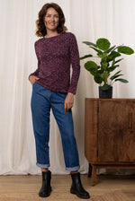 An image of the Lily & Me Monica Top Seagrass in Mulberry.