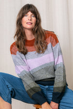 An image of the Lily & Me Art Colour Block Jumper in Olive.