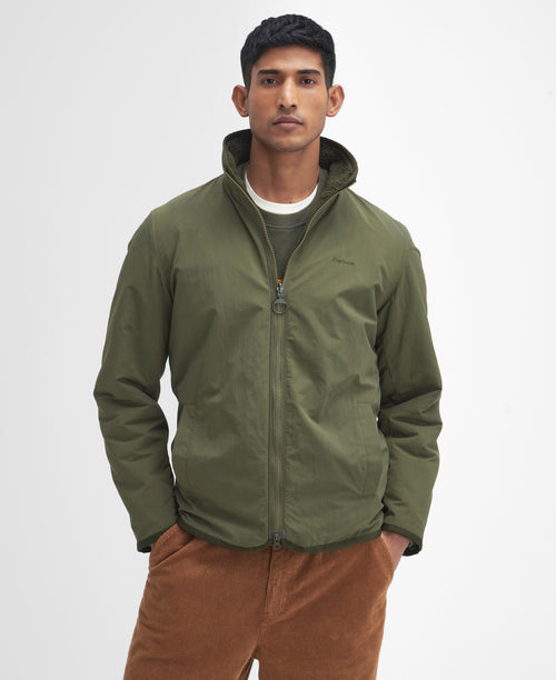 An image of the Barbour Reversible Fleece in Fern.