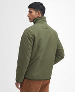 An image of the Barbour Reversible Fleece in Fern.