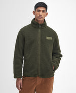 An image of the Barbour Reversible Fleece in Fern.