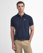 An image of the Barbour Tartan Pique Polo Shirt in Sapphire.