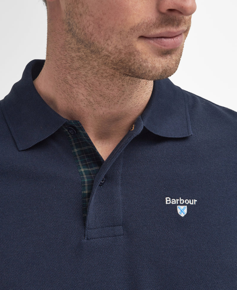 An image of the Barbour Tartan Pique Polo Shirt in Sapphire.