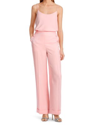 Marc Cain Wide Leg Wheaton Trousers. A wide leg, straight fit trouser with trimmed buttons, pockets and turn up hem. These trousers have a zip fastening and are a soft pink colour.