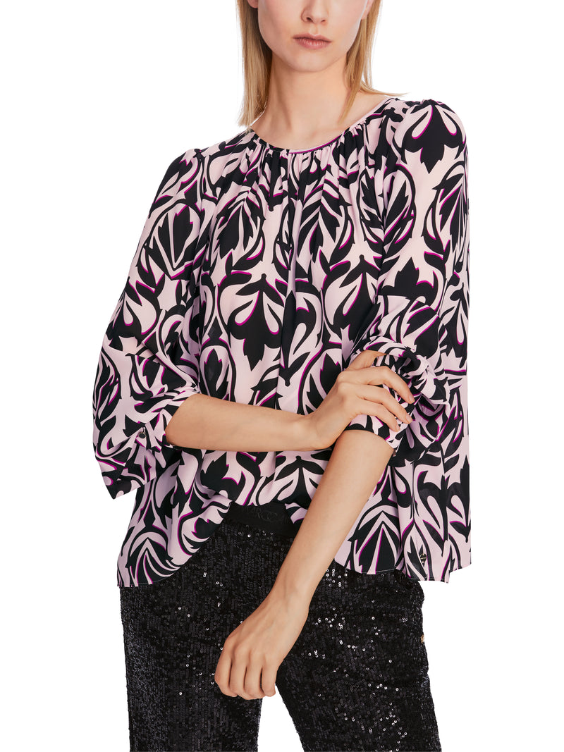 An image of the Marc Cain Patterned Blouse in Bright Rose Tan.