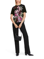 An image of the Marc Cain Blouse with Floral Print in Black.