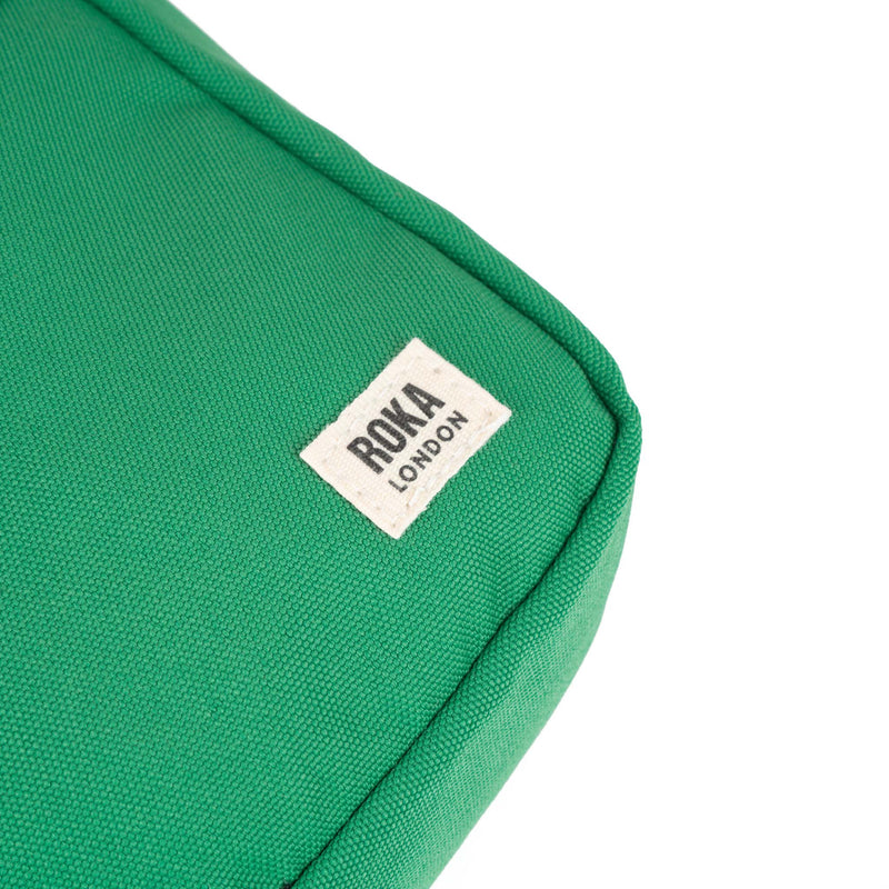 An image of the ROKA Bond Crossbody in Mountain Green.