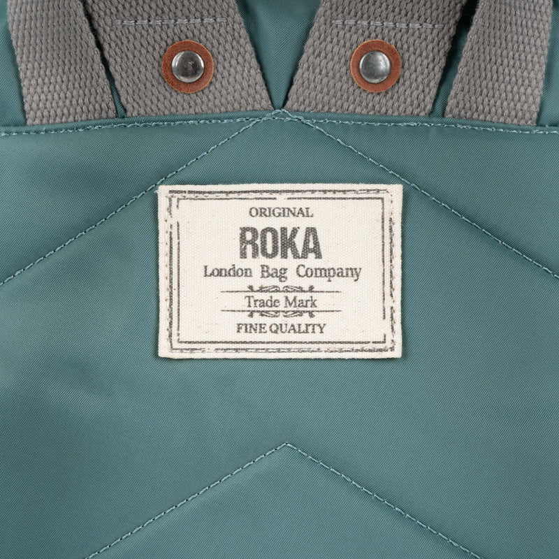 An image of the ROKA Canfield B Backpack in Sage.