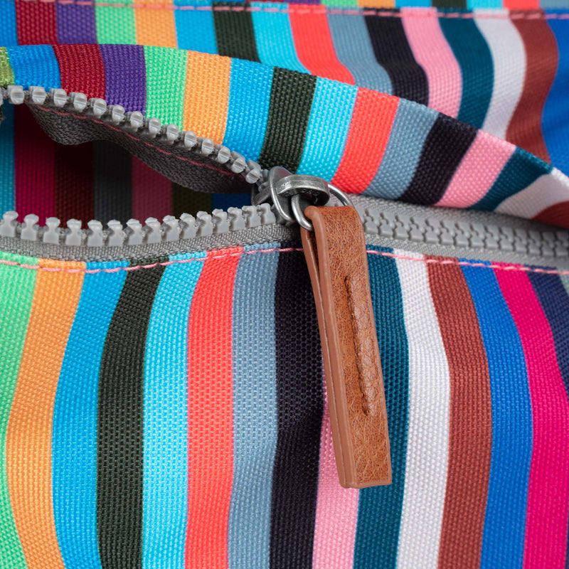 An image of the ROKA Kennington B Crossbody in Multi Stripe.