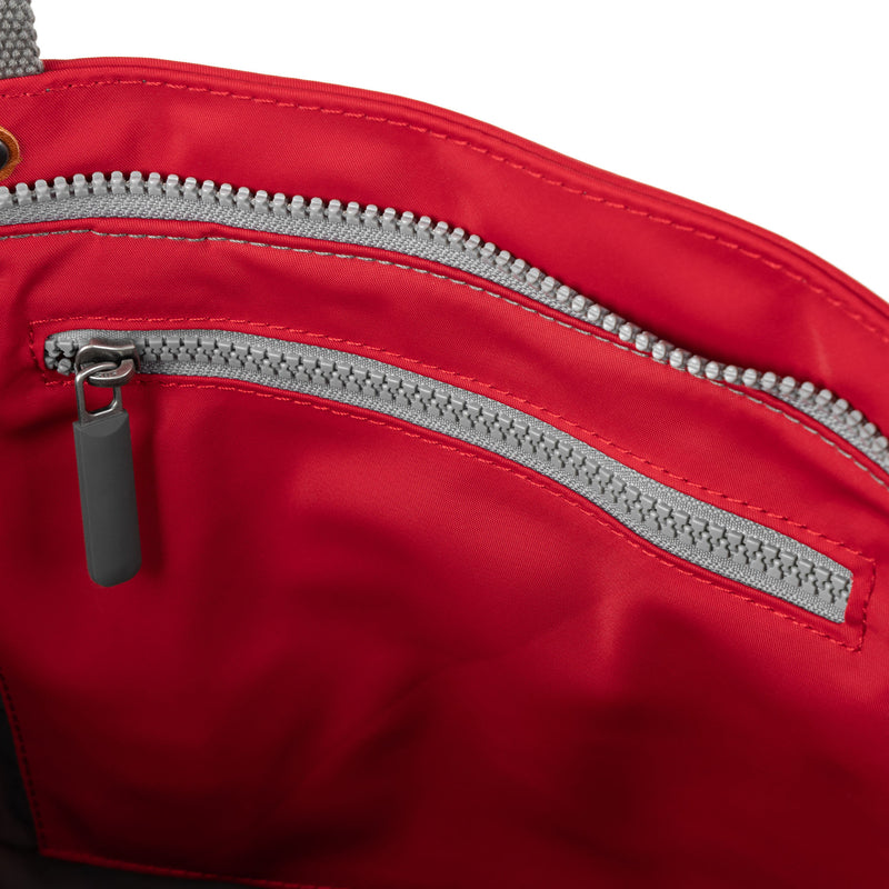 An image of the ROKA Trafalgar B Tote in Cranberry.