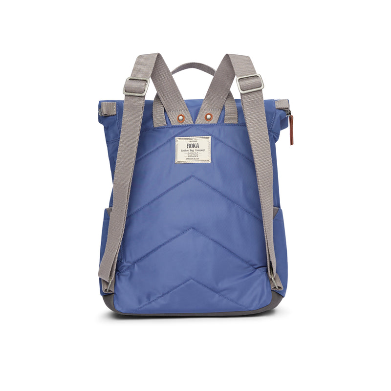 An image of the ROKA Canfield B Backpack in Burnt Blue.