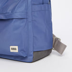 An image of the ROKA Canfield B Backpack in Burnt Blue.