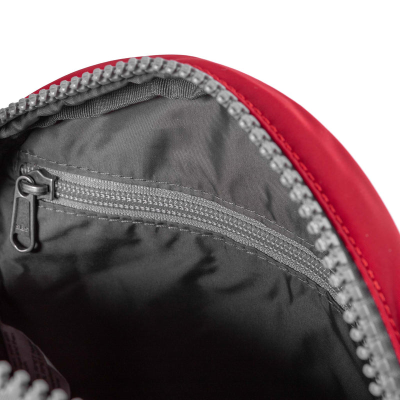 An image of the ROKA Paddington B Cranberry Small Recycled Nylon.