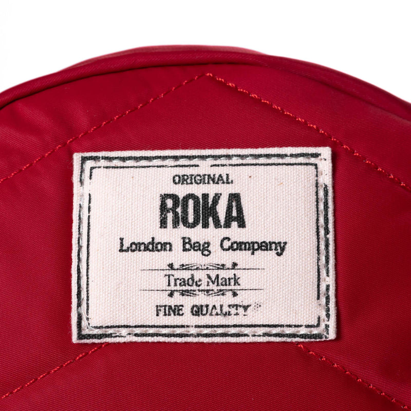 An image of the ROKA Paddington B Cranberry Small Recycled Nylon.