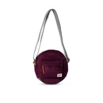 An Image of the ROKA Paddington B Crossbody in Plum.