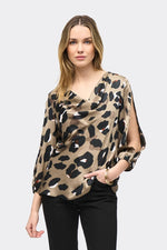 An image of a model wearing the Joseph Ribkoff Animal Print Top in Black/Multi.