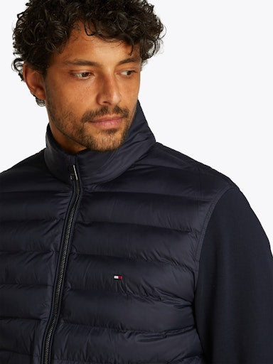 An image of the Tommy Hilfiger Stand Collar Quilted Sweatshirt in Desert Sky.