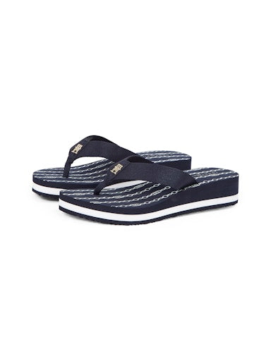 An image of the Tommy Hilfiger TH Monogram Wedge Flip-Flops