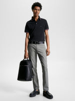 An image of the Tommy Hilfiger 1985 Collection Tipped Slim Fit Polo in the colour Black.