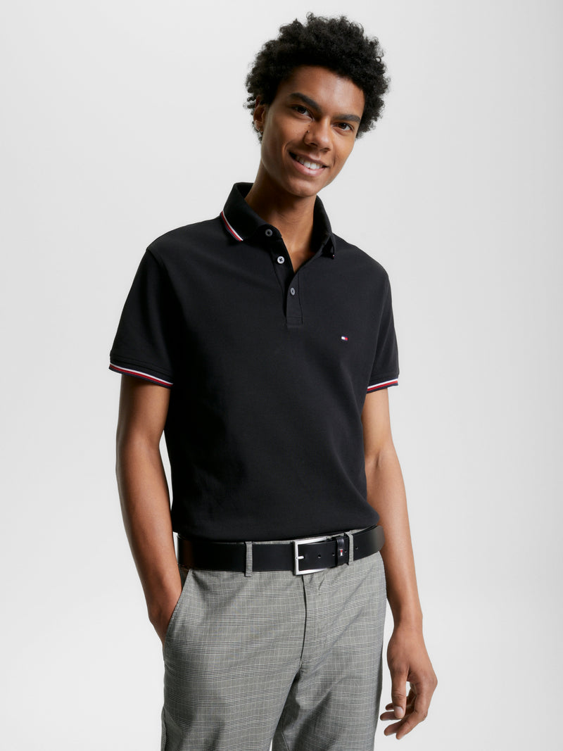 An image of the Tommy Hilfiger 1985 Collection Tipped Slim Fit Polo in the colour Black.