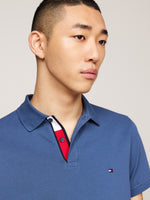 An image of the Tommy Hilfiger Tipped Placket Flag Embroidery Polo in the colour Aegean Sea.