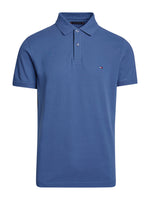 An image of the Tommy Hilfiger Tipped Placket Flag Embroidery Polo in the colour Aegean Sea.