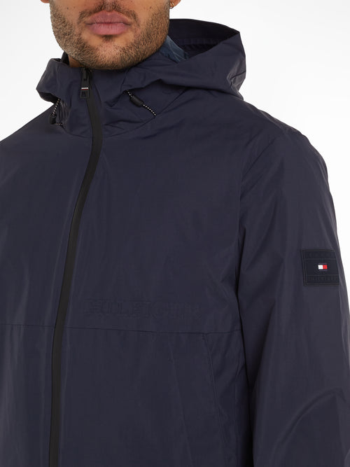 An image of the Tommy Hilfiger Portland Hooded Jacket in the colour Desert Sky.