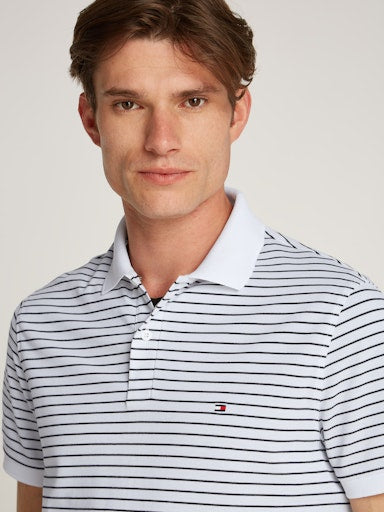 An image of the Tommy Hilfiger Performance Pique Polo Shirt in White/Desert Sky.