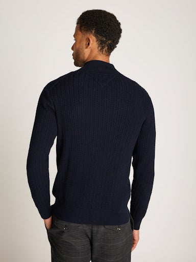 An image of the Tommy Hilfiger Herringbone Knit Half-Zip Jumper in Desert Sky.