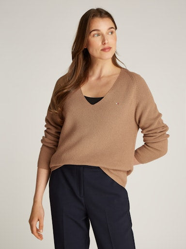 An image of the Tommy Hilfiger Cable Knit V-Neck Jumper in Safari Canvas.