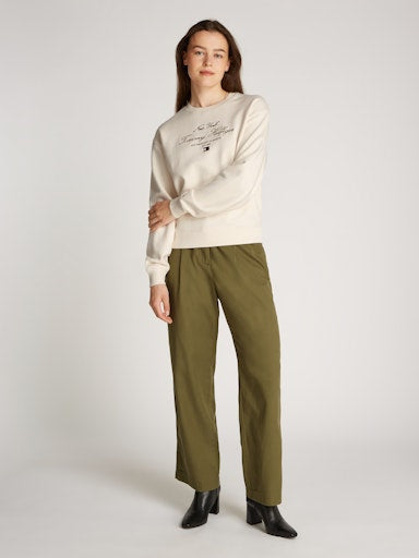 An image of the Tommy Hilfiger Script Sweatshirt in Ivory.