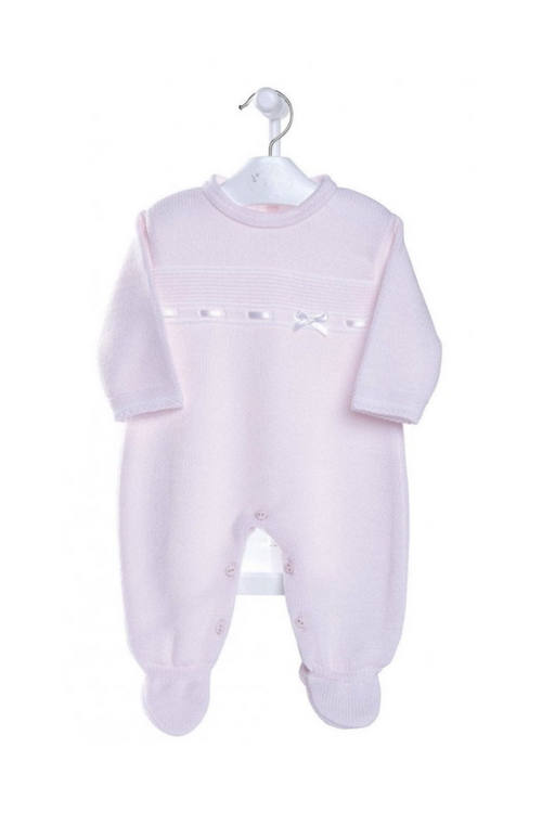 An image of the Dandelion Knitted Onesie in Pink.