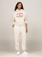 An image of the Tommy Hilfiger Varsity Logo Embroidery Joggers in Classic Beige.