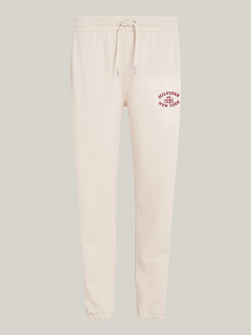 An image of the Tommy Hilfiger Varsity Logo Embroidery Joggers in Classic Beige.