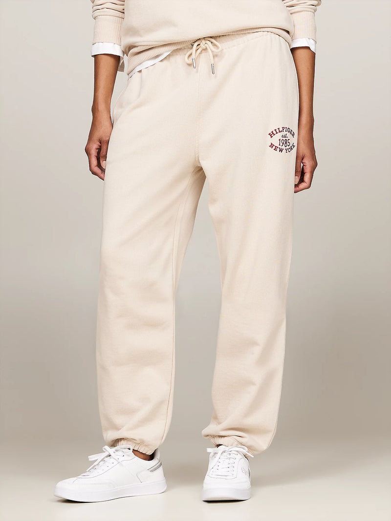 An image of the Tommy Hilfiger Varsity Logo Embroidery Joggers in Classic Beige.