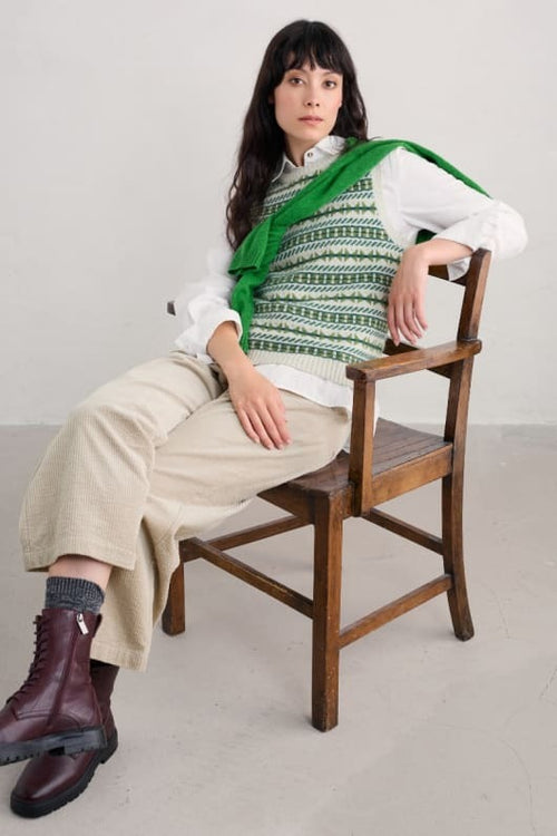 An image of the Seasalt Lemon Porch Vest in Minvor Aran Cut Grass.