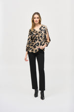 An image of a model wearing the Joseph Ribkoff Animal Print Top in Black/Multi.