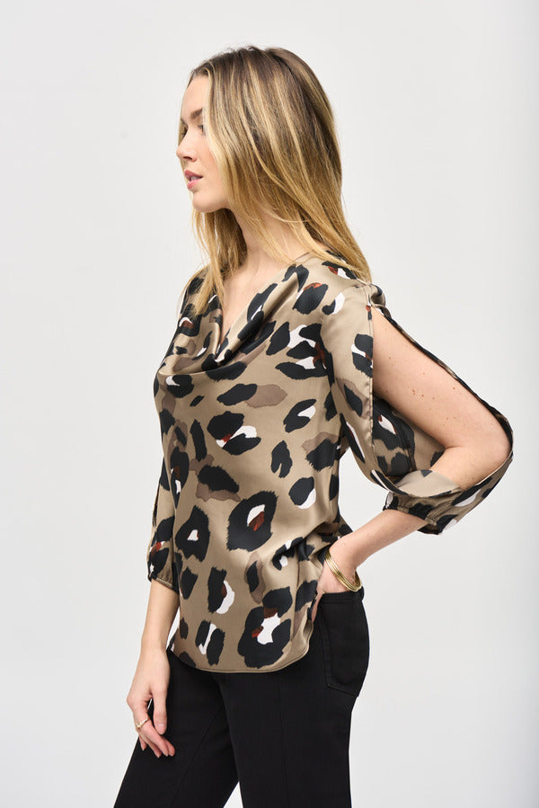 An image of a model wearing the Joseph Ribkoff Animal Print Top in Black/Multi.