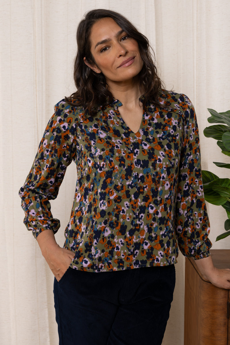 An image of the Lily & Me Braidstone Blouse Floral Ikat in Olive.