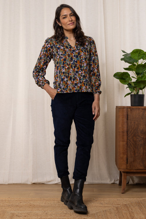 An image of the Lily & Me Braidstone Blouse Floral Ikat in Olive.