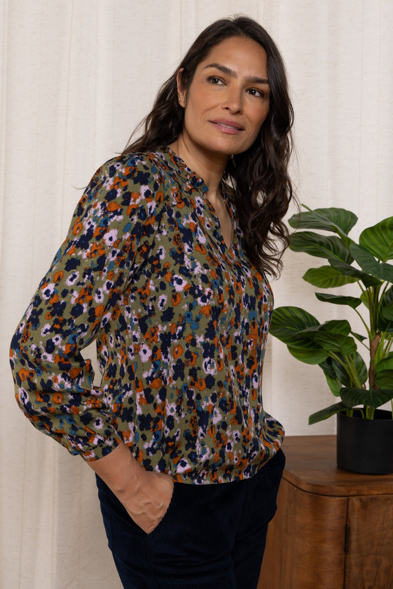 An image of the Lily & Me Braidstone Blouse Floral Ikat in Olive.