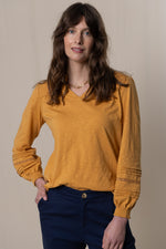 An image of the Lily & Me Bette Top in Mustard.