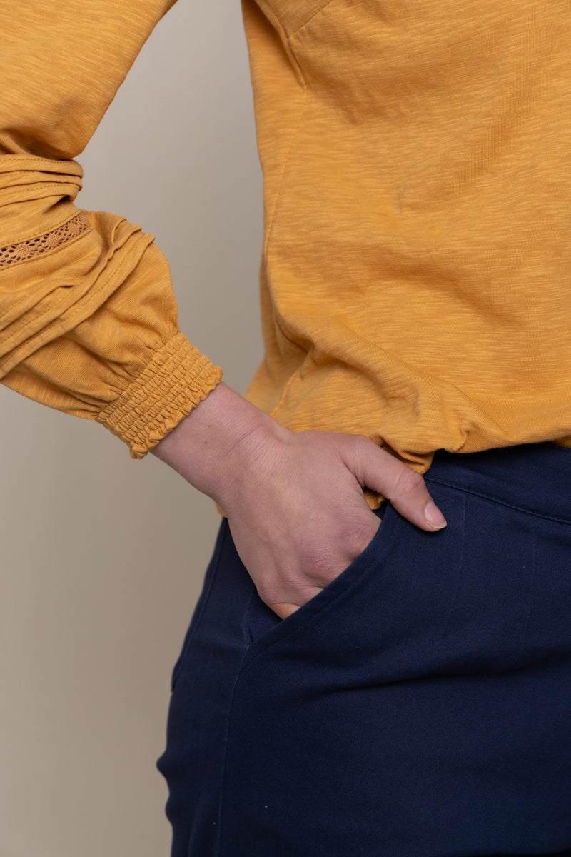 An image of the Lily & Me Bette Top in Mustard.