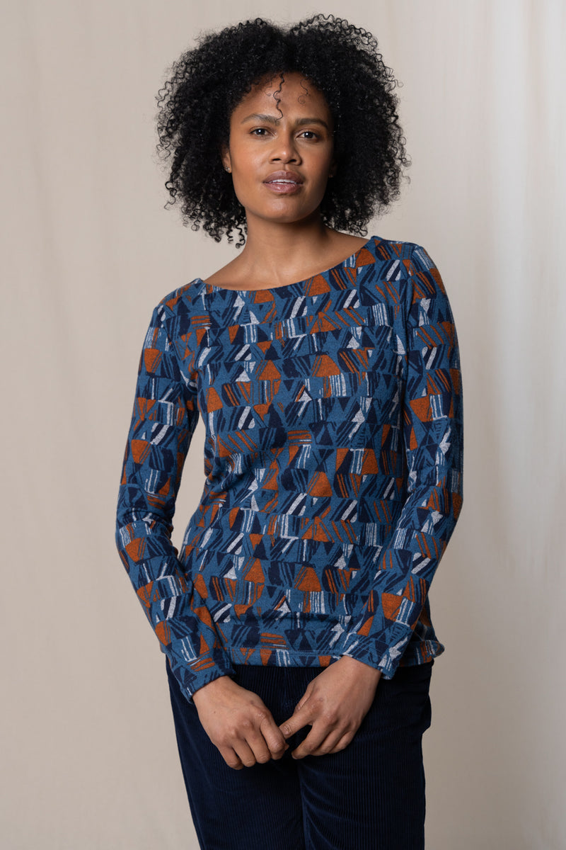 An image of the Angela Top Etching in Blue.